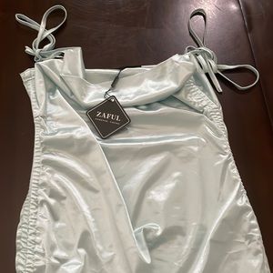 im selling this mint color silk dress.